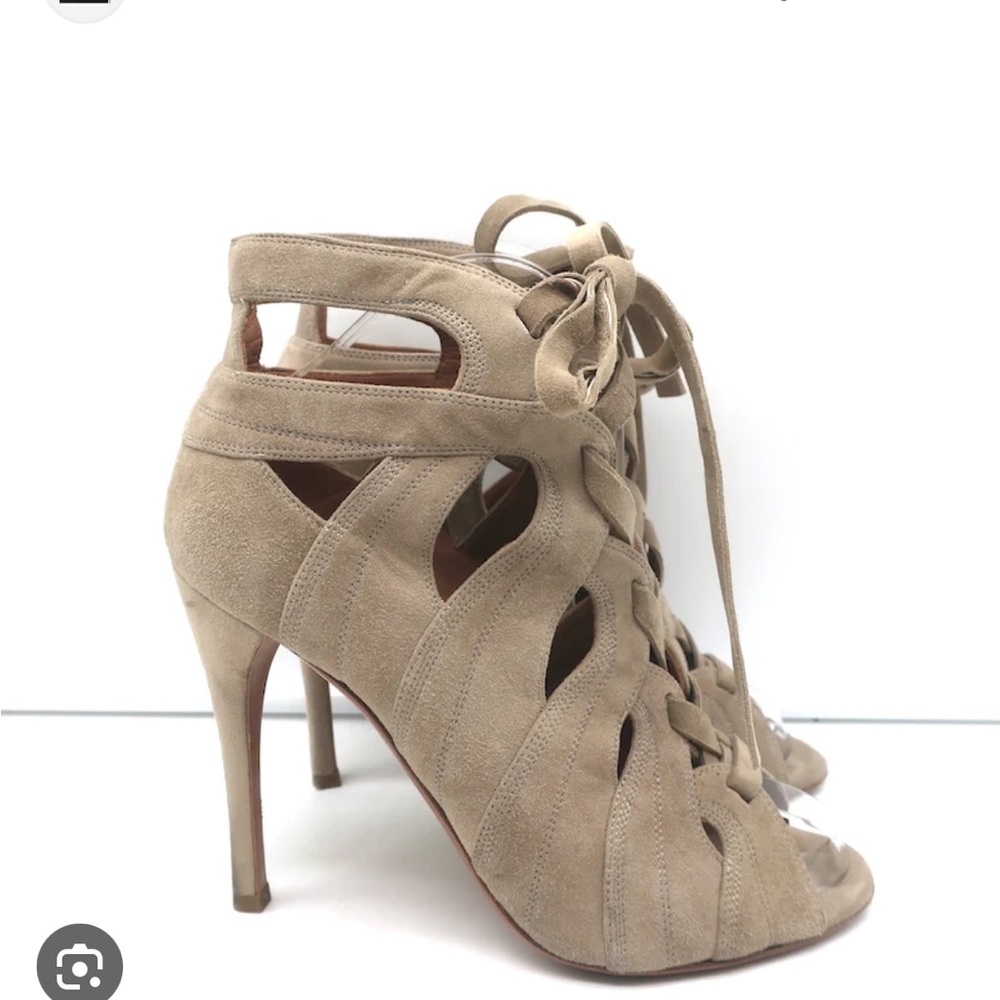 Iconic ALAIA peep toe bootie